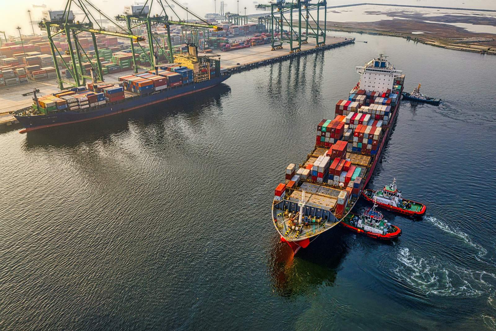 Container ship loading at port
